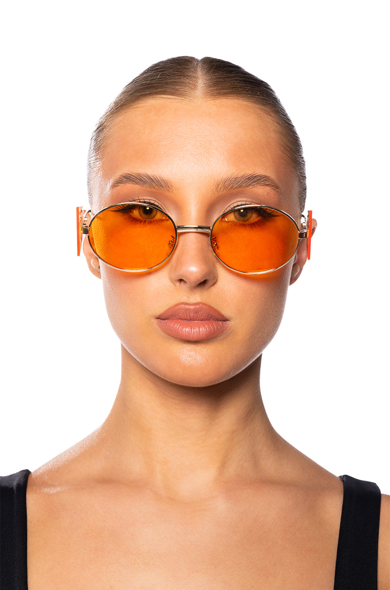 CONTEMPORARY ART RIMLESS SUNNIES IN ORANGE