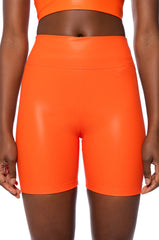RIO FAUX LEATHER BIKER SHORT IN ORANGE