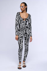 TURNING HEADS KNIT LONG SLEEVE JUMPSUIT IN BLACK
